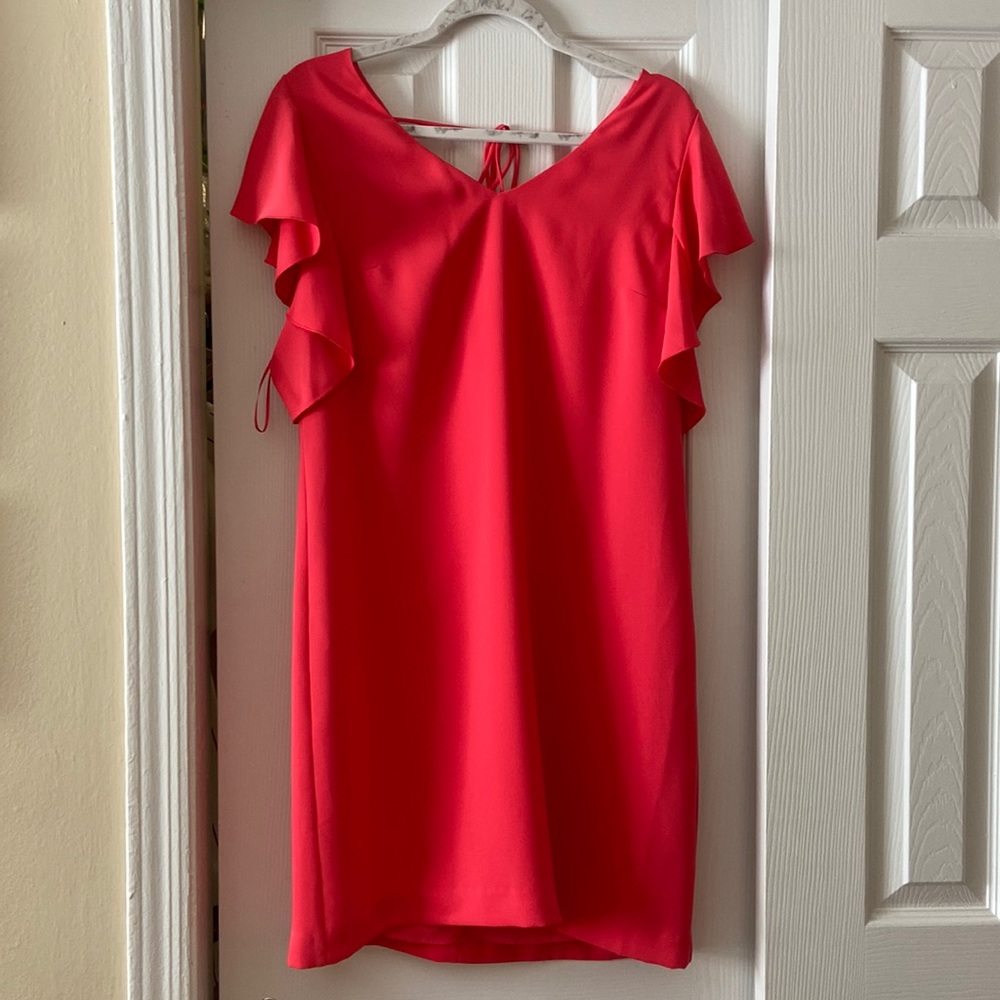 NWT Trina Turk Coral/Bright Pink Shift Dress hits just above the knee.